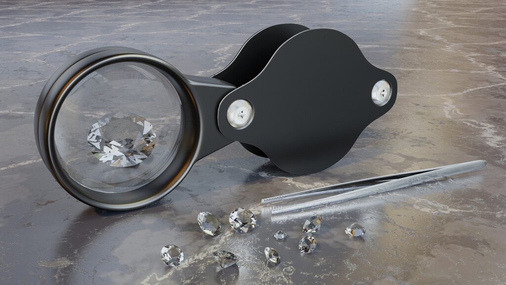 gems and magnifying loupe. natural loose gemstones and jewelry